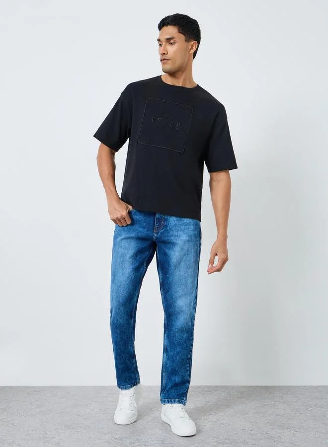 Men Blue Tapered Fit Washed Jeans